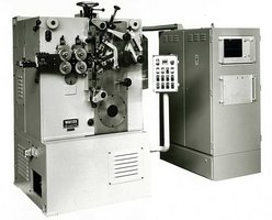 1978 Machine à fabriquer les ressorts de compression 